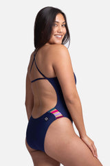 JOLYN Australia, Julian contrast, onesie in the navy colour. Studio image of the side of the onesie.