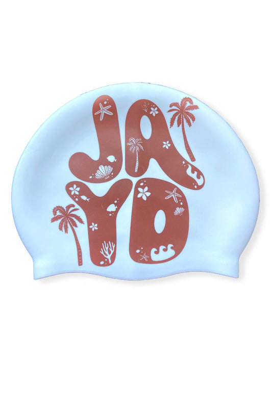 White Island Palms JAYD swim cap in cacao, featuring palm trees, starfish, shells & other ocean illustrations