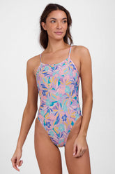 JOLYN Australia, printed athletic onesie in the glow print. Model wears the fixed back Perry onesie