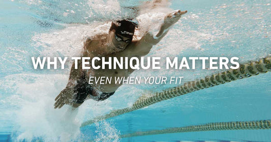 Swimmer training with correct technique to improve efficiency, reduce fatigue and maximise performance, demonstrating that technique matters as much as fitness.
