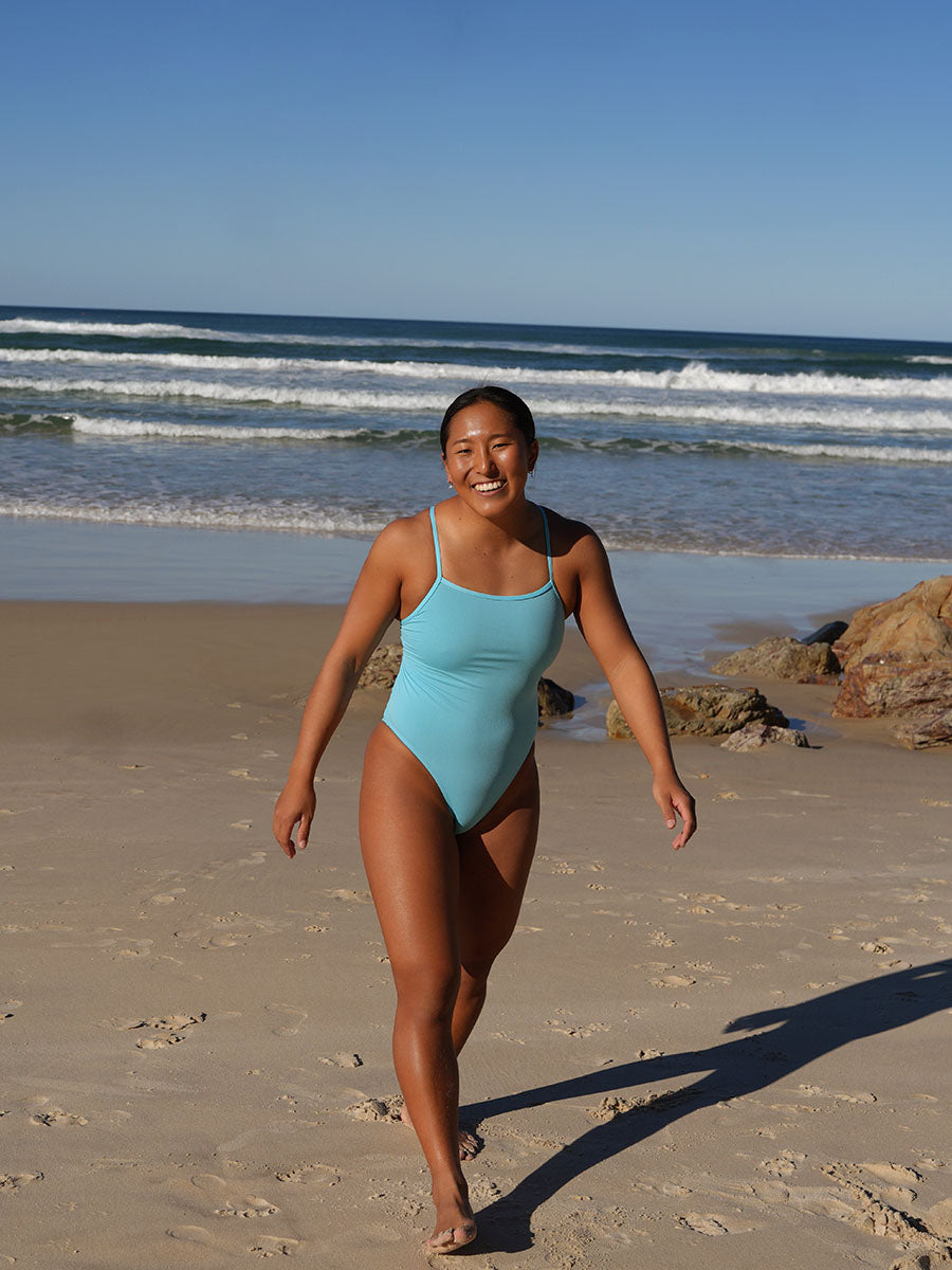JAYD Swimwear Siena fixed back one piece as worn by surf athlete Sara in the colour Mykonos. This piece is chlorine resistant and built for performance.