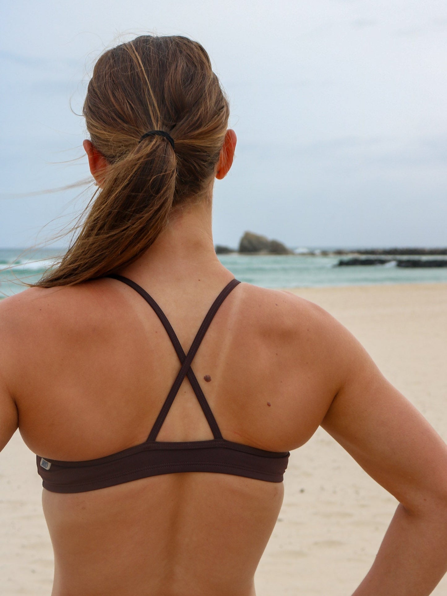 Close back strap view of JAYD Swimwear Torquay bikini top in cacao.