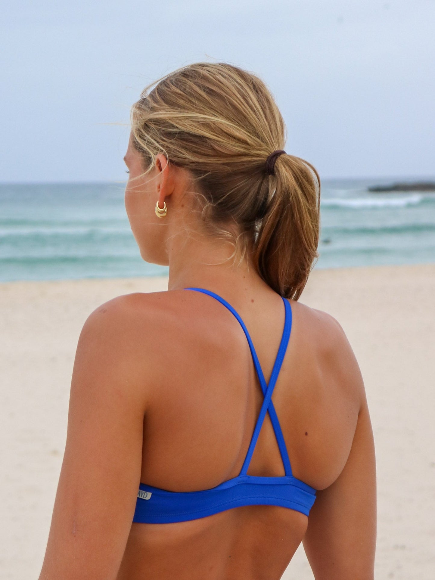 Close back strap view of JAYD Swimwear Cobalt blue Torquay bikini.
