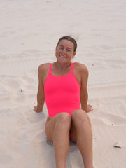 JAYD Swimwear, athletic one piece, Finley in the Fiesta colour. Frontal seated image.