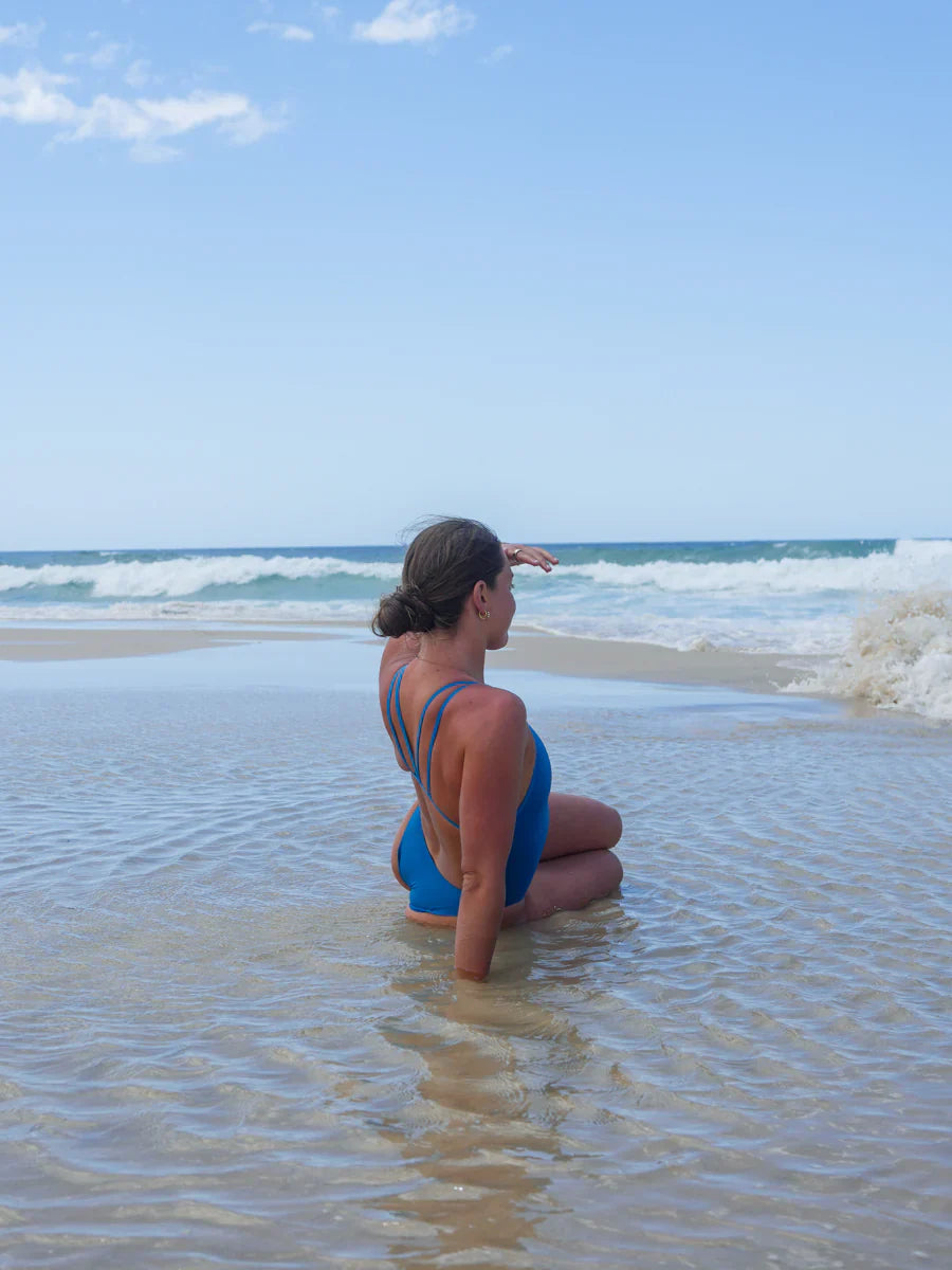Back view of the double-strapped Finley One Piece Athletic Swimsuit in Nordic Blue, by JAYD Swimwear.