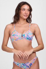 JOLYN Australia, printed athletic bikini top in the glow print. Model wears the tie-back tomcat top 