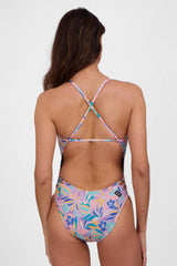 JOLYN Australia, printed athletic onesie in the glow print. Model wears the Julian onesie