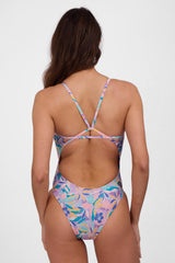 JOLYN Australia, printed athletic onesie in the glow print. Model wears the fixed back Perry onesie